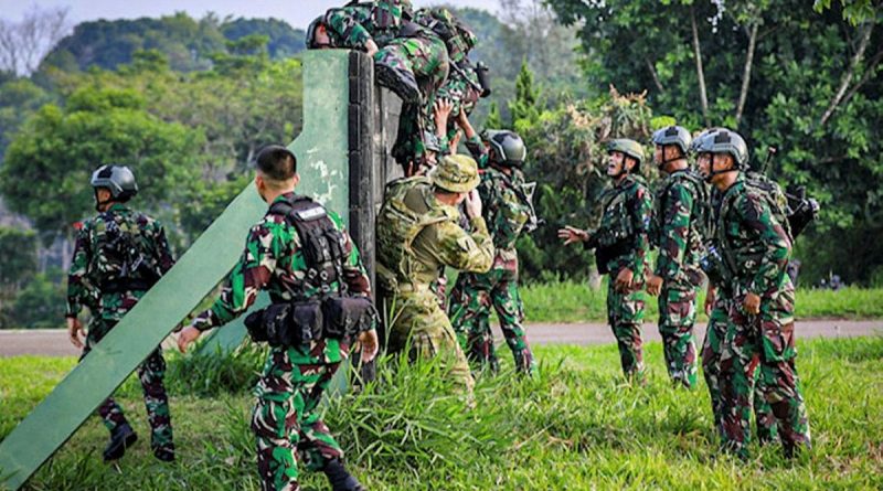 Indonesia Army Junior Officer Combat Instructor Training course trainees take part in the obstacle course challenge as part of Exercise True Grit with Australian Army instructors in Indonesia. Story by Lieutenant Douglas Mayfield.