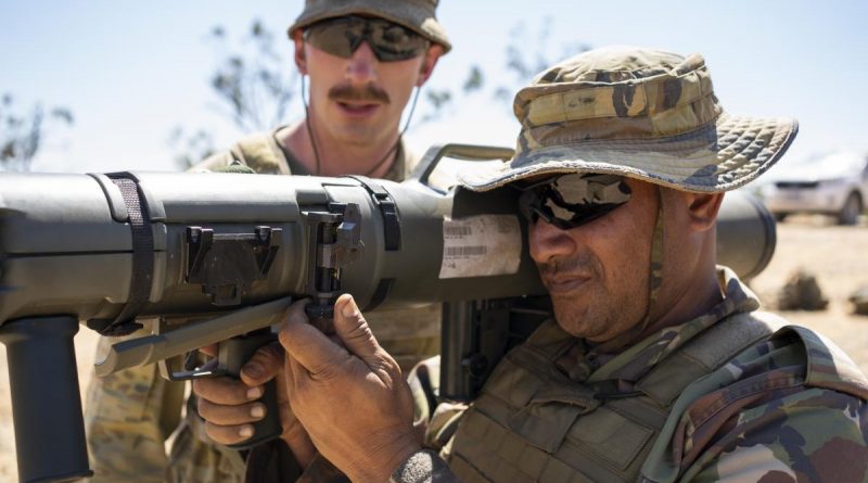 Australian Army Private Ryan Robertson conducts weapon training on the 84mm Carl Gustav with Papua New Guinea Defence Force Corporal Shaun Bereda during Exercise Kumul Exchange 21 at the Townsville Field Training Area. Story by Private Jacob Joseph. Photo by Corporal Brandon Grey.