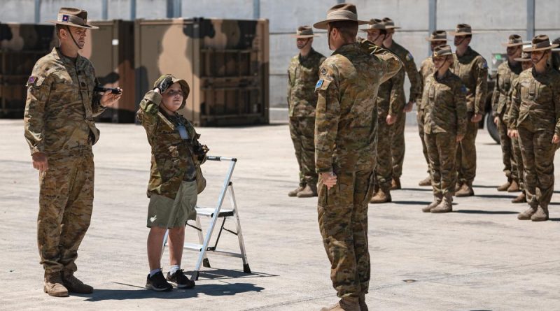 Make-A-Wish recipient Adam salutes the Commanding Officer of the 2nd Combat Engineer Regiment, Lieutenant Colonel Henry Stimson, while on parade during his visit to Gallipoli Barracks, Brisbane. Story by Captain Jesse Robilliard. Photo by Corporal Nicole Dorrett.