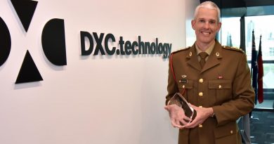 Army reservist Captain Gareth Morgan receives the Prince of Wales Award at his workplace, DXC Technology, in Fortitude Valley, Brisbane. Story by Captain Evita Ryan.