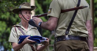 Lieutenant Colonel Jacqueline Costello receives the 1st Phycology Unit's flag from Warrant Officer Class One Craig Webb during a Flag Lowering Ceremony for the 1st Psychology Unit, at Victoria Barracks, Sydney. Photo by Private Jack Brook.