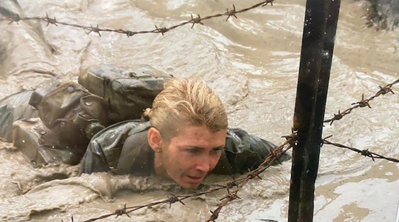 Sergeant Kym Walker tackles an obstacle course during Battle PT. Story by Flight Lieutenant Nick O’Connor.