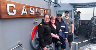 Officer of the Watch, Sub-Lieutenant Emma Bennett with her Mum, Dad and brother during a Family Day on board HMAS Gascoyne. Story by Lieutenant Michael Hutchesson.