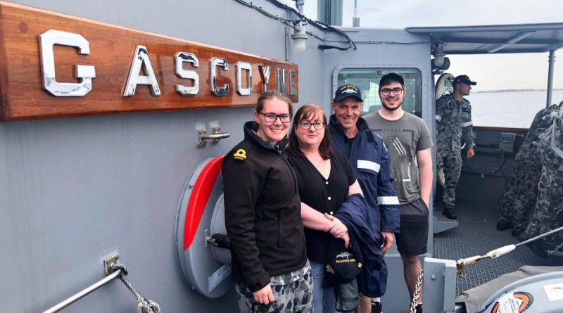 Officer of the Watch, Sub-Lieutenant Emma Bennett with her Mum, Dad and brother during a Family Day on board HMAS Gascoyne. Story by Lieutenant Michael Hutchesson.