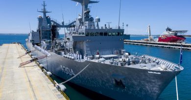 The crew of HMAS Stalwart line the ship's upper decks during its commissioning ceremony at Fleet Base West, Rockingham. Story by Lieutenant Gary McHugh. Photo by Leading Seaman Richard Cordell.