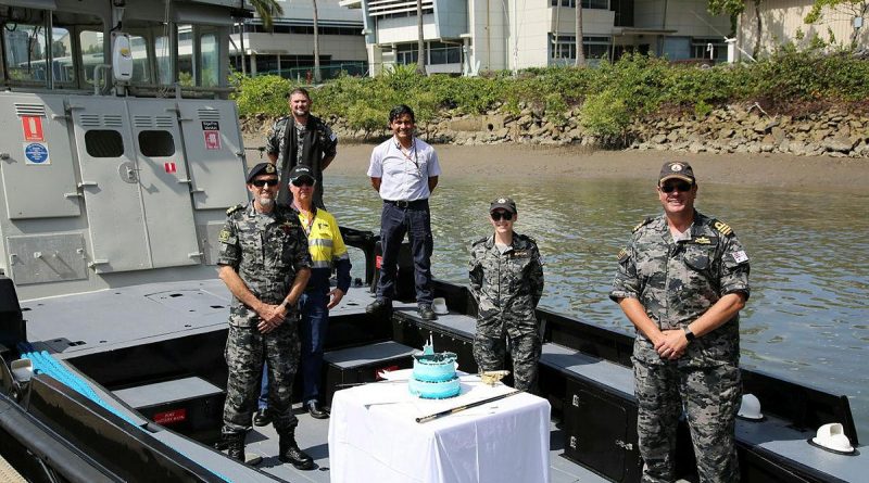 (L-R) LCDR Kevin Whatling, Naval Architect Mr Marc Richards, CHAP Bradley Galvin, Serco Marine Services Juan Camilo Ruiz Del Rio, Hydrographic Systems Operator Suzanne Burton and CO HMAS Cairns CMDR Glenn Williams on Naval Workboat Otter at HMAS Cairns. Story by Lieutenant Gordon Hutcheon.