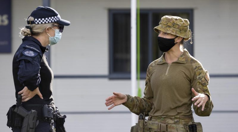 Australian Army Captain Celie Bright-Perry speaks with an AFP health planner during their deployment to Solomon Islands. Story by Corporal Brodie Cross. Photo by Corporal Brandon Grey.