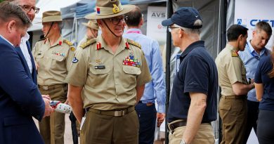 Chief of Army, Lieutenant General Rick Burr, AO, DSC, MVO, speaks with an Australian industry employee at the C4-EDGE capability display at Russell Offices in Canberra. Story by Captain Sarah Kelly. Photo by Sergeant Cameron Pegg.