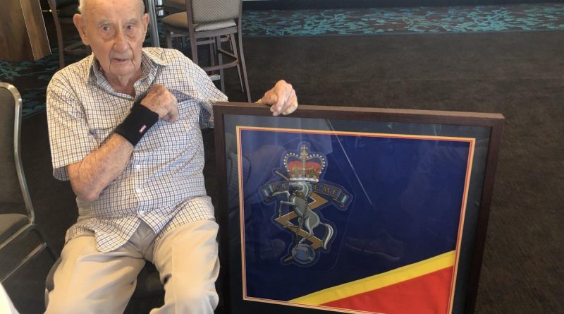 Herbert Barker celebrates his 100th birthday with family and friends on December 13. Story by Private Jacob Joseph.