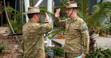 Outgoing Commander of the 7th Brigade, Brigadier Jason Blain, right, receives the brigade pennant from Regimental Sergeant Major Warrant Officer Class One Matthew Bold at Gallipoli Barracks, Brisbane. Story by Captain Jesse Robilliard. Photo by Corporal Nicole Dorrett.