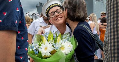 Seaman Cloe Reichelt is welcomed by her mother at Fleet Base East, Sydney, after HMAS Brisbane returned to her home port at the end of a three-month deployment. Story by Lieutenant Nancy Cotton. Photo by Able Seaman Susan Mossop.