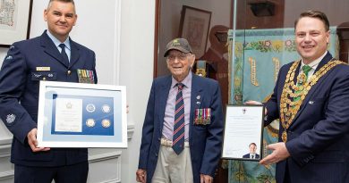 Warrant Officer Michael McDonnell, left, and Lord Mayor of Brisbane Councillor Adrian Schrinner, right with WWII veteran and centenarian Esdale Davis. Story by Squadron Leader Tina Turner. Photo: by Corporal Jesse Kane.