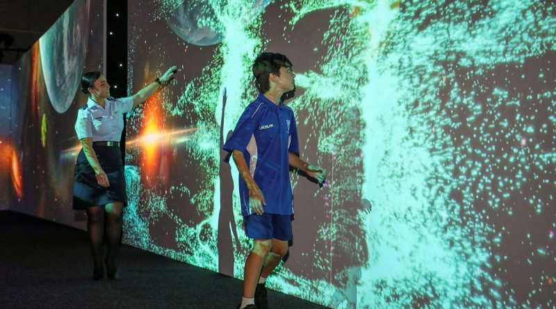 Leading Aircraftwoman Chantelle Bradford and Nailsworth Primary School student Lachlan enjoy the interactive experience of the Science Alive! expo in Adelaide. Story by Leading Aircraftwoman Jasna McFeeters. Photo by Corporal Brenton Kwaterski.