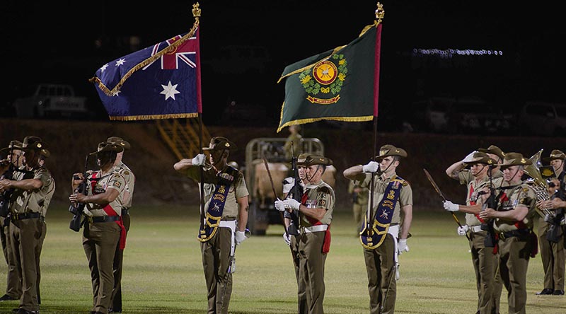 Pilbara Regiment Colour Ensigns present the Colours for the first time. Photo by Sergeant Gary Dixon.