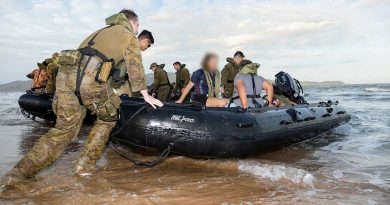 Soldiers from the 2nd Battalion, Royal Australian Regiment, prepare to take participants of the Proud Warrior Youth Engagement Program for a ride in the Zodiac MK2 inflatable boat at Pallarenda Beach, Queensland, in September. Story by Captain Lily Charles. Photo by Corporal Brandon Grey.