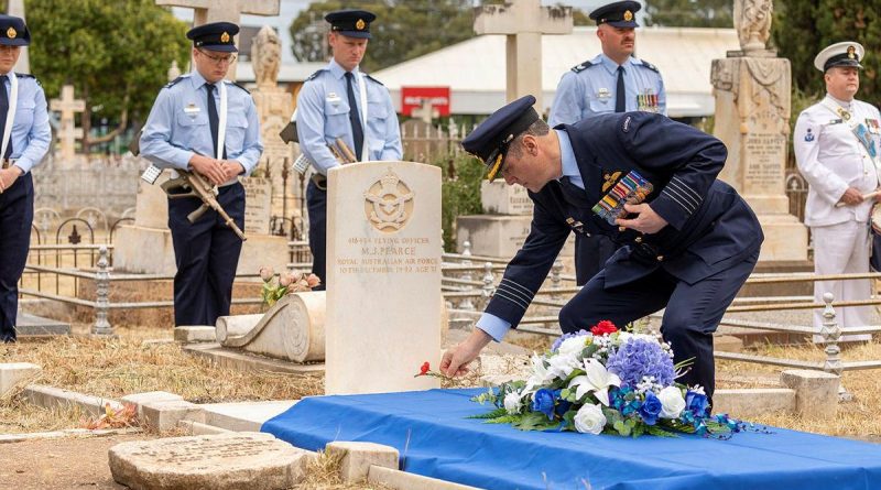 Officer Commanding No. 92 Wing Group Captain John Grime lays a poppy at the grave of Flying Officer Maxwell Pearce in Salisbury, South Australia. Story by Flight Lieutenant Nat Giles. Photo by Leading Aircraftman Stewart Gould.