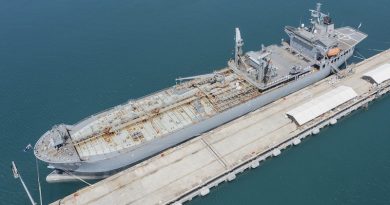 Ship's Company line the deck during HMAS Sirius' Decommissioning at Fleet Base West, Western Australia. Photo by Petty Officer Yuri Ramsey.