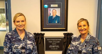 Warrant Officer of the Air Force Fee Grasby, left, and Commanding Officer of the RAAF School of Postgraduate Studies Wing Commander Kerry Hollings open the Warrant Officer of the Air Force Gallery at the school. Photo by Sergeant John Marshall.