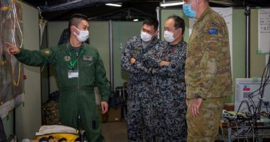 A Royal Australian Air Force officer receives a brief during Exercise Yama Sakura 81 in Japan. Story by Captain Michael Trainor.