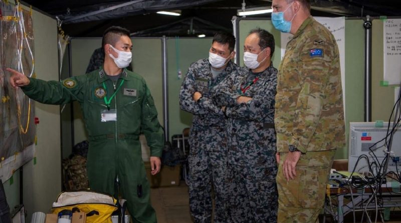A Royal Australian Air Force officer receives a brief during Exercise Yama Sakura 81 in Japan. Story by Captain Michael Trainor.