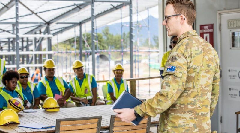Army officer Captain Cameron Laing provides a site brief to Fijian TAFE students at the Blackrock Redevelopment Project in Fiji.