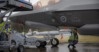 Armament Technicians from No. 3 Squadron, load a new Australian manufactured Bomb Live Unit (BLU 111) configured as a Guided Bomb Unit (GBU-12) onto F-35A Lightning II aircraft A35-040 at RAAF Base Williamtown, NSW. Story by Flying Officer Bronwyn Marchant. Photo by Corporal Craig Barrett.