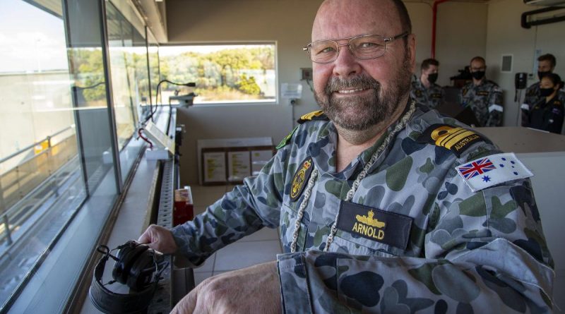 Officer-in-charge of the West Head gunnery range in Victoria, Lieutenant Commander Peter Arnold, prepares for a 76mm medium calibre firing against a towed surface target as part of annual continuation training. Story by Petty Officer Lee-Anne Cooper. Photo by Petty Officer James Whittle.