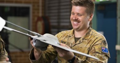Bombadier Mitchell Yates looks at a Wasp AE Small UAS at the Army Reserve Kogarah Depot in Sydney. Story by Captain Mark Beretta. Photo by Corporal Dustin Anderson.