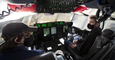 Summer School students on the flight deck of a No. 37 Squadron C-130J Hercules during a visit to RAAF Base Richmond, NSW. Story by Eamon Hamilton. Photo by Corporal David Said.