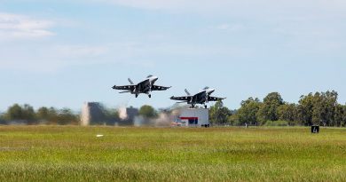 Two F/A-18F Super Hornets from No. 1 Squadron A44-211 (left) and A44-218, depart RAAF Base Amberley. Story by Flying Officer Robert Hodgson. Photo by Leading Aircraftwoman Emma Schwenke.