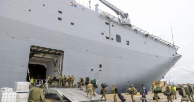 ADF personnel embark onto HMAS Adelaide at the Port of Brisbane before departure on Operation Tonga Assist 2022. Story by Captain Zoe Griffyn. Photo by Corporal Robert Whitmore.