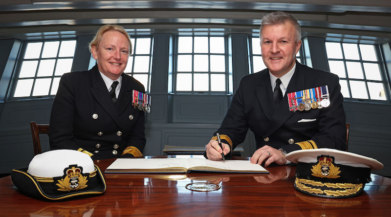 Rear Admiral Jude Terry and Rear Admiral Philip Halley in the 'Great Cabin' of HMS Victory, Portsmouth, UK. Royal Navy photo – Crown copyright.
