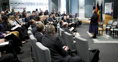 Dr Lacy Pejcinovic welcomes guests to the Profession of Arms Seminar at the Australian Defence College, Weston Creek, Canberra. Story by Sofija Brown. Photo by Grace Costa Banson.