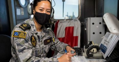 Navy sailor Leading Seaman Christine Fine on the bridge of HMAS Adelaide during Operation Tonga Assist 2022. Story by Lieutenant Brendan Trembath. Photo by Corporal Robert Whitmore.