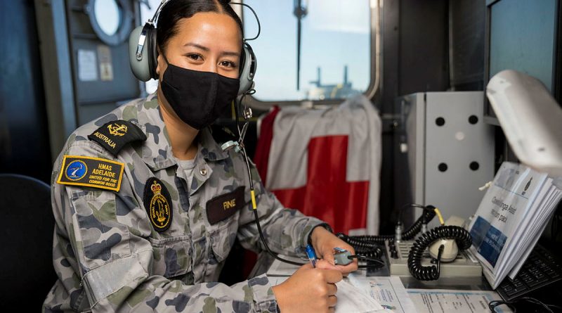 Navy sailor Leading Seaman Christine Fine on the bridge of HMAS Adelaide during Operation Tonga Assist 2022. Story by Lieutenant Brendan Trembath. Photo by Corporal Robert Whitmore.