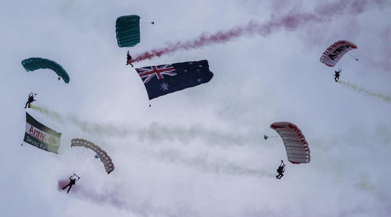 Australian Army soldiers from the ADF Parachuting School's Red Berets parachute display team drop into Sydney's Australia Day festivities. Story by Major Dan Mazurek. Photo: by Corporal Sagi Biderman.