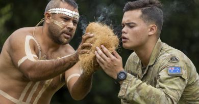 Private Raymond Gunning from 10th Force Support Battalion and Mr Les Tanna from the Wulgurukaba Walkabouts during the totem ceremony in Townsville. Story by Captain Annie Richardson. Photo by Corporal Brodie Cross.