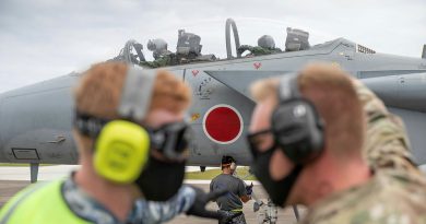 Leading Aircraftman Ronan Geoghgan (left) from No. 23 Squadron and a United States airman prepare to refuel a Japan Air Self-Defense Force (Koku-Jieitai) F-15J Eagle aircraft during Exercise Cope North. Story by Flying Officer Bronwyn Marchant. Photo by Leading Aircraftman Sam Price.