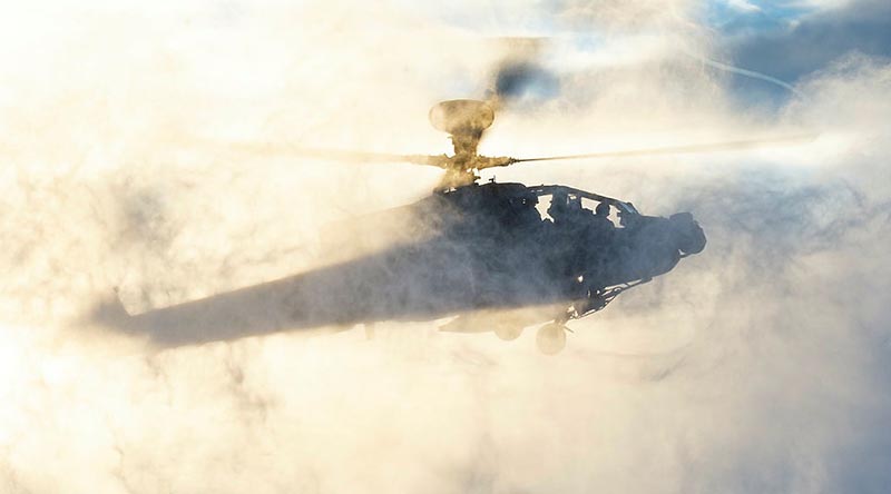 A British Army Apache AH1D makes a snow landing inside the Arctic Circle in Norway. UK MOD © Crown copyright 2021 – photo by Corporal Jamie Hart