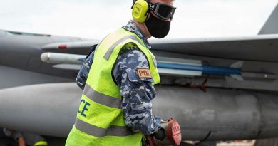 Leading Aircraftman Ronan Geoghgan, from No. 23 Squadron, retrieves a hose after refuelling a Japan Air Self-Defense Force F-15J Eagle aircraft at Andersen Air Force Base, Guam, during Exercise Cope North 2022. Story by Flying Officer Bronwyn Marchant. Photo by Leading Aircraftman Sam Price.