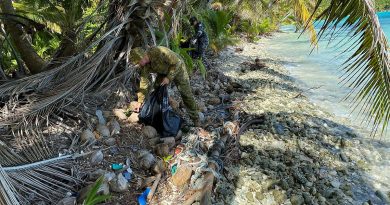 HMAS Glenelg personnel clean-up a beach on Direction Island, which is part of the Cocos (Keeling) Islands group, during their recent Operation Resolute deployment. Story by Lieutenant Gordon Carr-Gregg. Photo by Sub Lieutenant Luke Bennet.