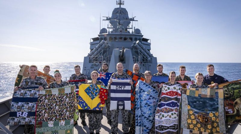 HMAS Anzac crew deployed on Indo-Pacific Endeavour 2021 show the personalised quilts and laundry bags made for them by volunteers from Aussie Hero Quilts. Story by Leading Seaman Kylie Jagiello. Photo by Leading Seaman Leo Baumgartner.