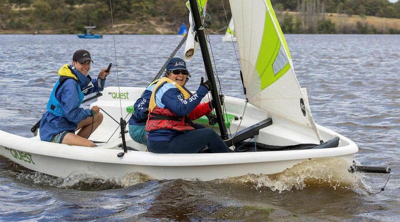 Flight Lieutenant Joy Clarke, right, takes part in the SheSails Discover Sailing Day run by the ADF Sailing Association in Canberra. Photo by Leading Aircraftwoman Jacqueline Forrester.