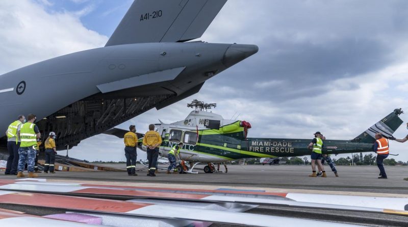 The New South Wales Rural Fire Service’s newly acquired Bell 412 helicopter is unloaded from a RAAF C-17A Globemaster III at RAAF Base Richmond. Story by Eamon Hamilton. Photo by Corporal Dan Pinhorn.