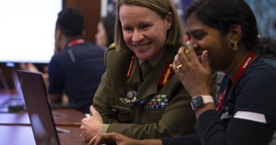 Head of Information Warfare Major General Susan Coyle meets Australian Defence Force Cyber Gap Program participant Shobita during the 2021 'capture the flag' cyber skills challenge in Canberra. Story by Bernadette Wright. Photo by Corporal Julia Whitwell.