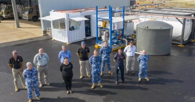 Defence and civilian personnel involved in successfully having the Retardant and Suppressant Computerised Automated Loading project completed on base at RAAF Base Edinburgh, South Australia. Story by Flight Lieutenant Dee Irwin. Photo by Leading Aircraftman Stewart Gould.