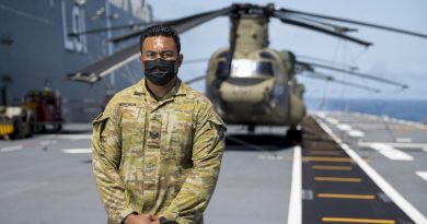 Army soldier Sergeant Alefosio Kakala on the flight deck of HMAS Adelaide during Operation Tonga Assist 2022. Story by Leading Seaman David Cox & Sergeant Alefosio Kakala. Photo by Corporal Robert Whitmore.