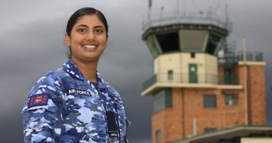 Royal Australian Air Force air traffic controller Pilot Officer Gulman Madahar, of No. 452 Squadron, in front of the RAAF Base Amberley air traffic control tower in Queensland. Story by Flight Lieutenant Jessica Aldred. Photo by Corporal Brett Sherriff.