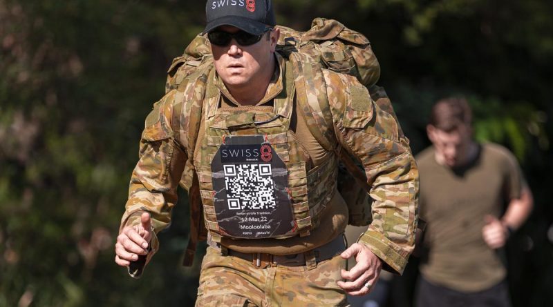 Captain Shannon Lemanski in training at Gallipoli Barracks wearing body armour and carrying an 18kg backpack. Story by Captain Taylor Lynch. Photo by Cpl Nicole Dorrett.