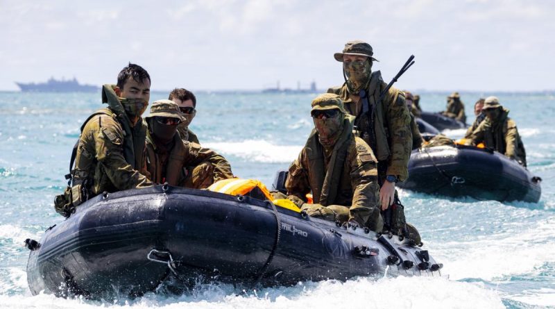 Soldiers from 2RAR's small boat platoon move 2nd Combat Engineer Regiment personnel onto Atata Island in Tonga. Story by Captain Zoe Griffyn. Photo by Petty Officer Jake Badio.